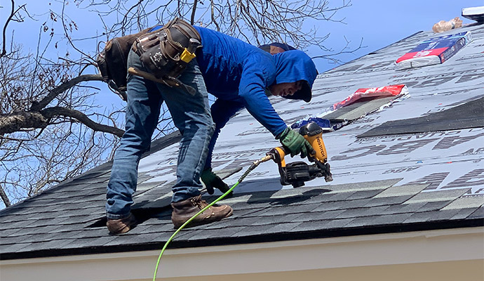 Boy Repairing Roof